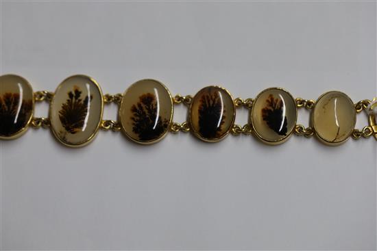 A late Victorian gold and moss agate bracelet, approximately 17cm.